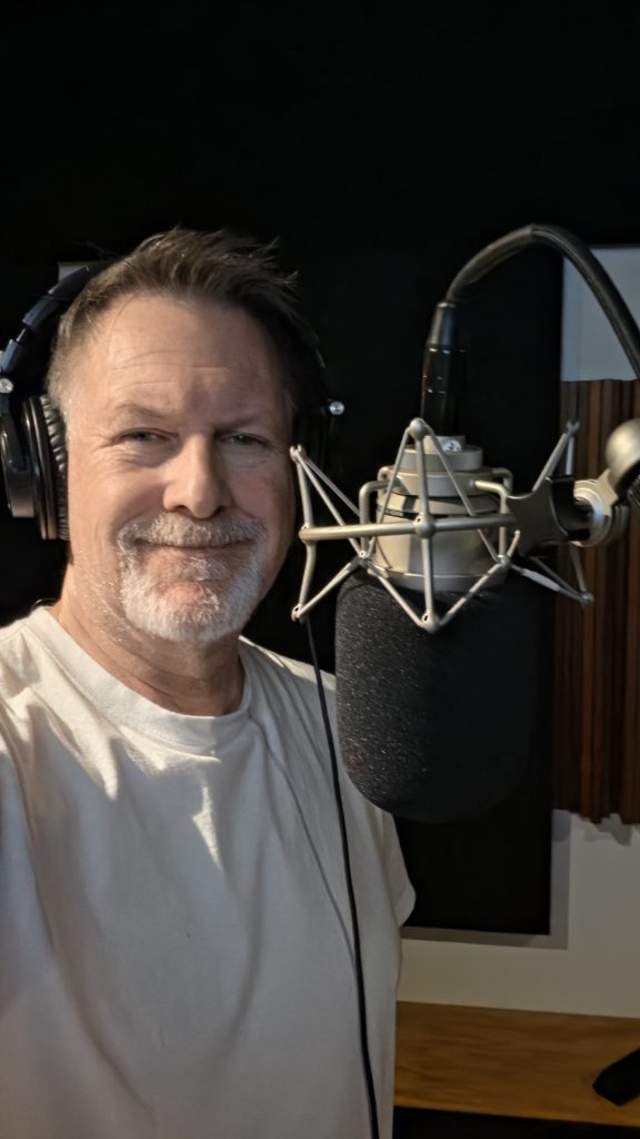 Todd Kozinka behind the mic